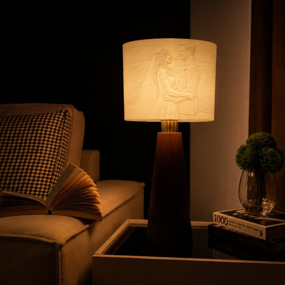 The Drum photo lamp, lit in a reading corner: a wedding photo glowing in the wide shade